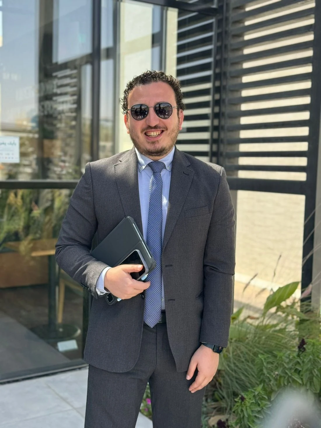 Ahmed Assem at business meeting